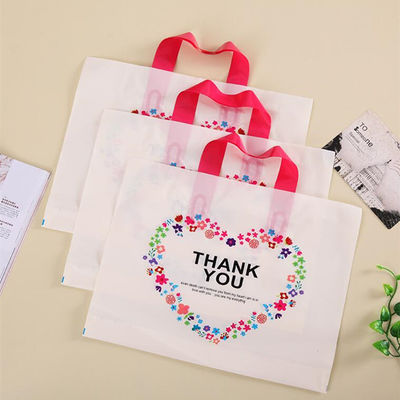 Sacos de compras plásticos personalizados para a loja do vestuário