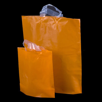 Sacos de compras reusáveis do logotipo feito sob encomenda da cor sólida, saco macio plástico do punho do laço